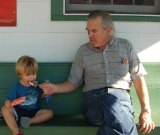 Connor and John enjoying ice cream on the porch at the Community Store.